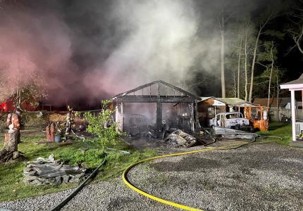 Image of garage destroyed in fire on James O Ct.