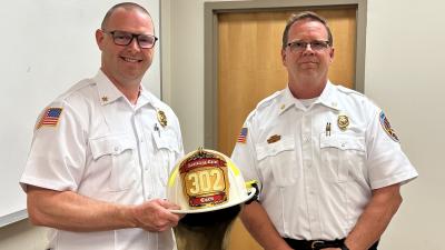Assistant Chief Corn and Chief Boulware pose for picture
